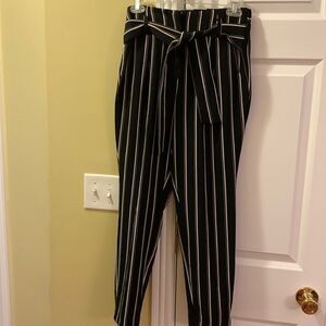 Body by Us Size Small black striped pants.  Pleated front with tie.
